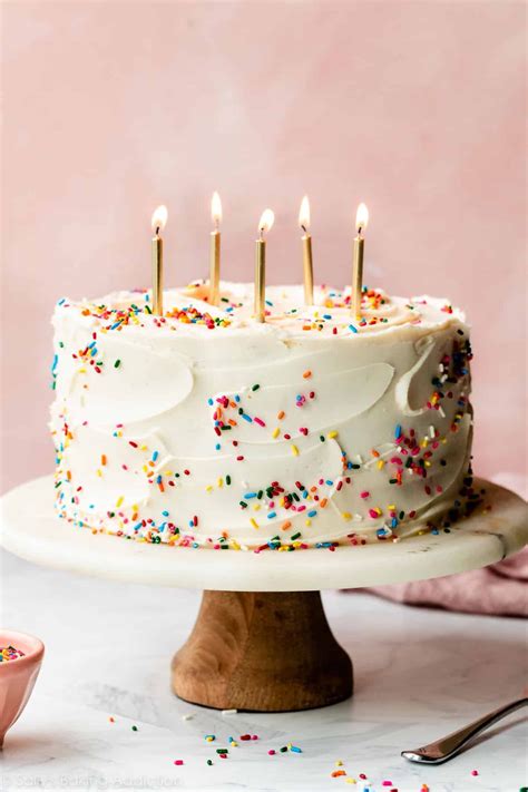Birthday cake with candles and confetti