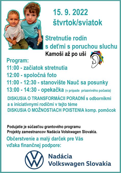 Skupina detí s poruchou sluchu a ich rodičov na vianočnom stretnutí