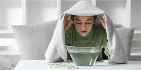 Image of a woman doing steam inhalation