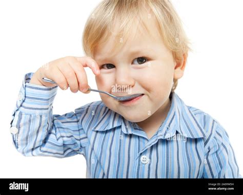 Child eating with a spoon