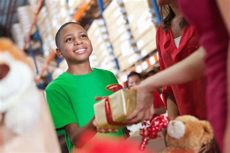 Children receiving gifts from a charity