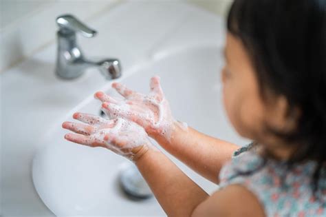 Child washing hands