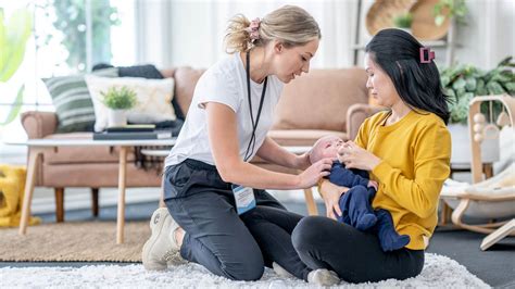 Lactation consultant assisting a mother
