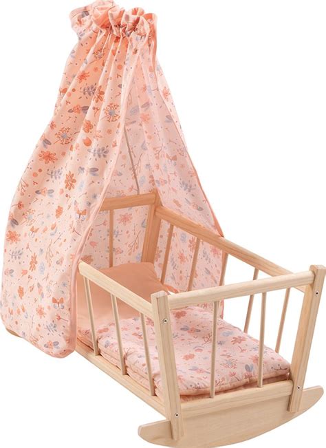 Drevená retro kolíska s ručným hojdacím mechanizmom