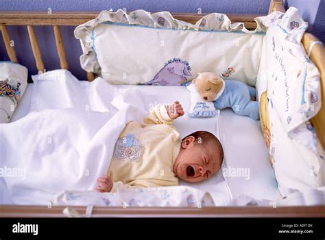 Baby crying in crib