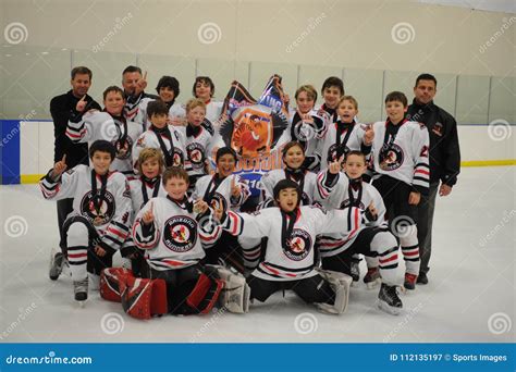 Youth hockey team celebrating