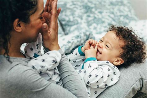Image of a newborn with parents, showing gentle interaction