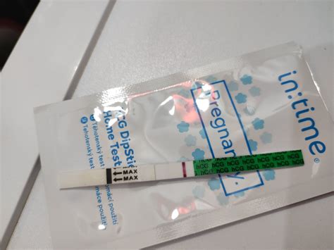 Obal lieku Duphaston a tehotenský test