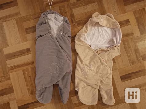 Prvky funkčného zimného fusaku (otvory na pásy, sťahovanie kapucne)