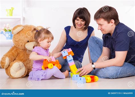 Happy child playing with a parent