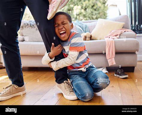 Child refusing to wear clothes, frustrated parent