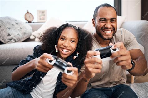 Parents and children playing video games together