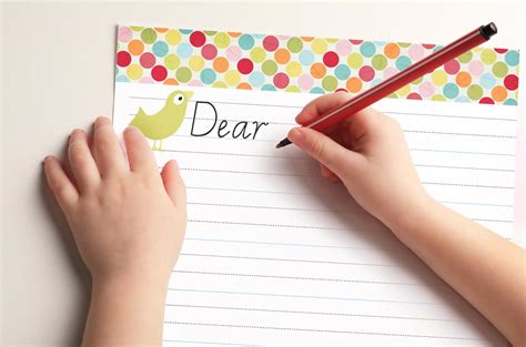 Child writing a letter by hand