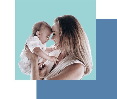 Matka držiaca v náručí novorodeniatko