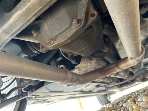 Detailný pohľad na systém Ganciomatic pripájajúci vaničku k podvozku