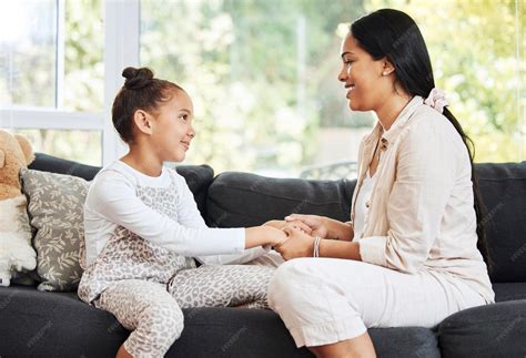 Thematic image: A parent gently talking to a child about kindness and listening.
