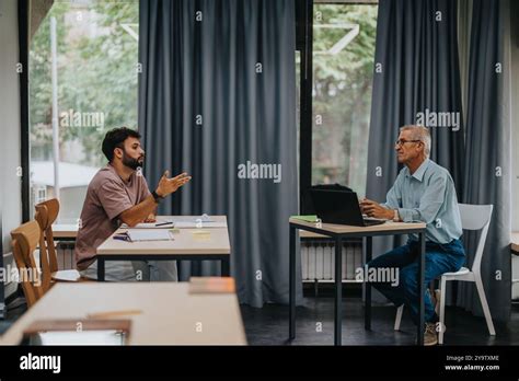 Professor and student in a classroom setting