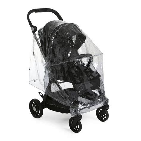 Child in a Chicco stroller with a footmuff and rain cover