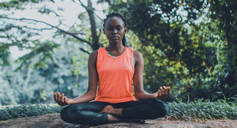 Person meditating to relieve stress