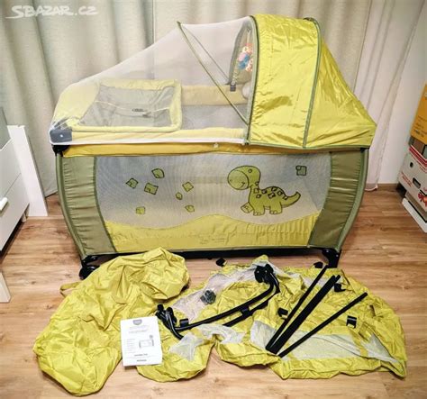 Detail látky a spracovania cestovnej postieľky Coto Baby Samba DINO