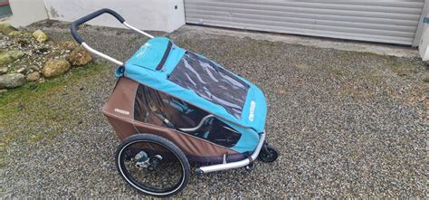 porovnávacia tabuľka cyklovozíkov Croozer vs. Thule