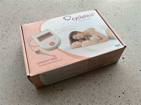 Zobrazenie ovulačného minipočítača Cyclotest Baby s displejom ukazujúcim plodné dni