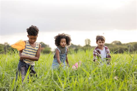 Children playing outdoors in nature