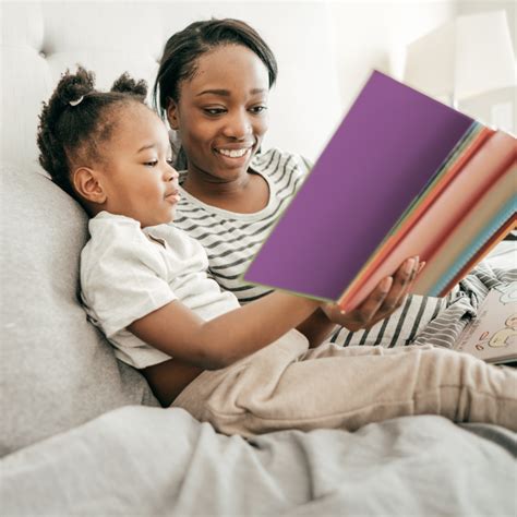 Child and parent reading together