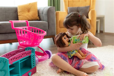 Child playing with doll bed in a safe environment