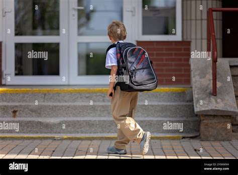 Thematic image: child starting school with a school bag