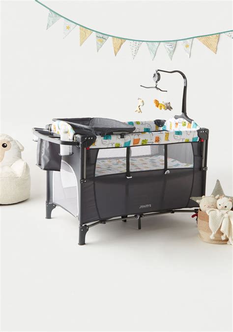 Travel cot with changing station diagram