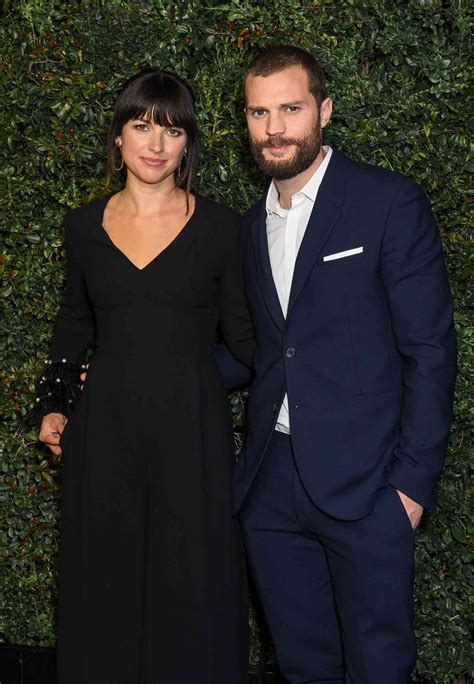 Jamie Dornan a Amelia Warner na červenom koberci