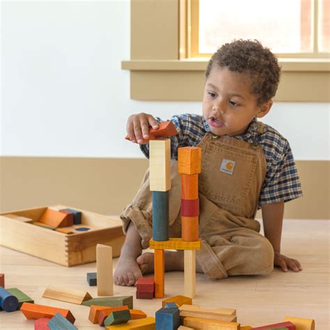 Toddler playing with building blocks