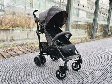 Skladací mechanizmus golfového kočíka Joie Brisk LX