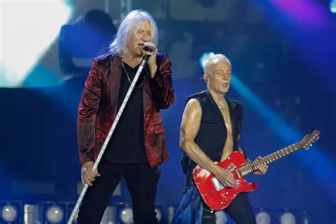 Def Leppard performing at a stadium