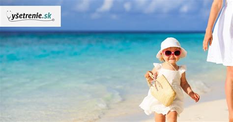 Lekár rozprávajúci sa s dieťaťom a rodičom