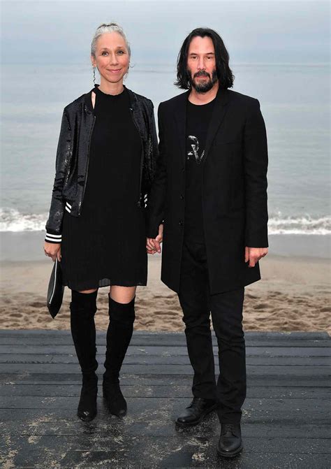 Keanu Reeves a Alexandra Grant na červenom koberci