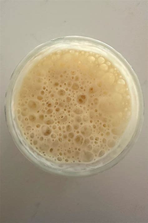 Close-up of active sourdough starter with many bubbles