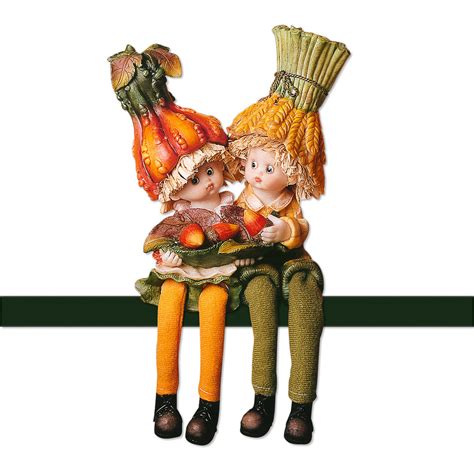 dieťa sediace s oporou vankúšov